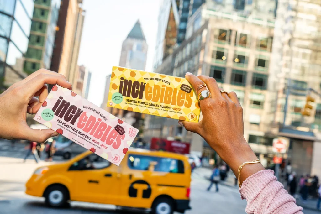 Skip the Smoke: Discreet Cannabis for Family Gatherings 2 Hands holding cannabis edible packages outdoors