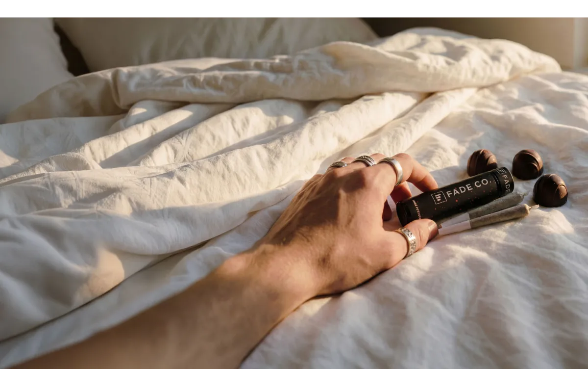 hand holding a Fade Co. pre-roll