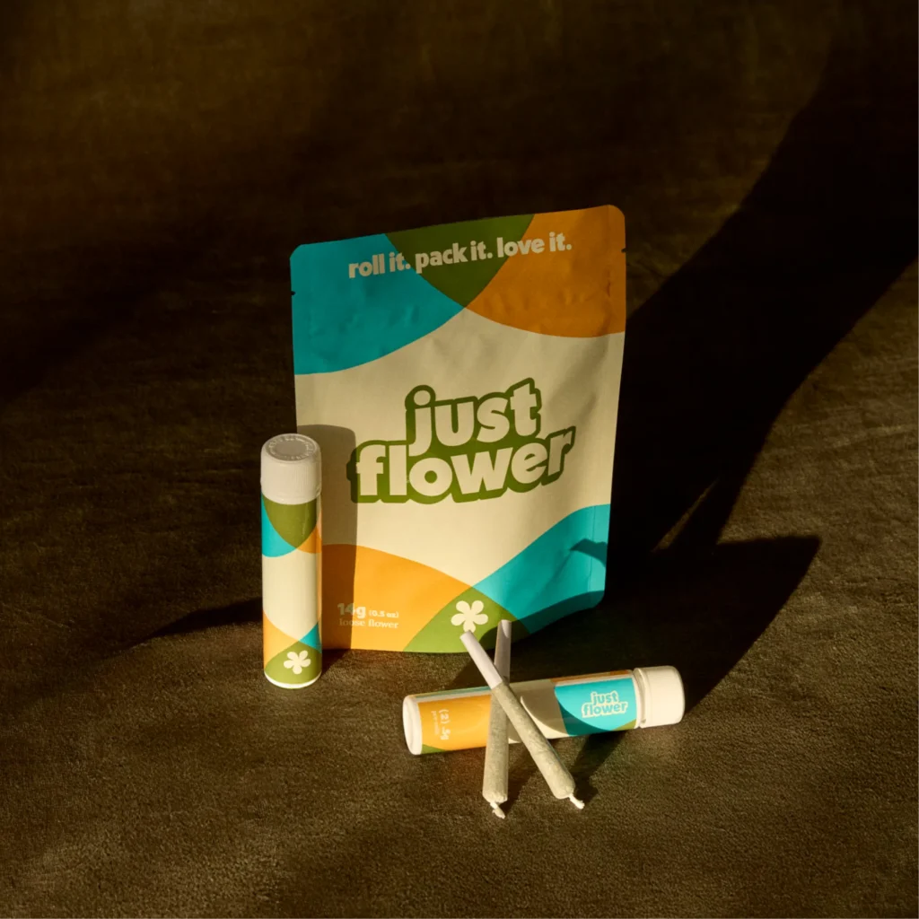 product shot of just flower pre-rolls on a dark olive background